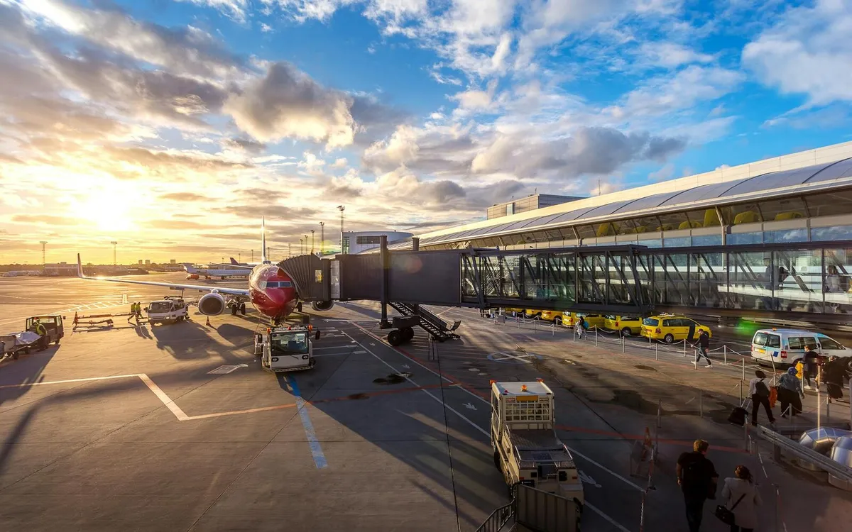 Aircraft at an airport gate before international travelers enter the arrivals process