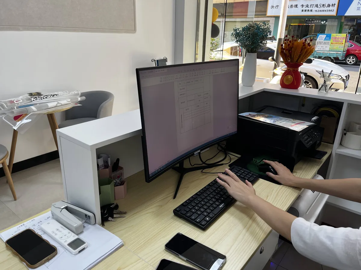 Travel office support staff handling booking communication and service details