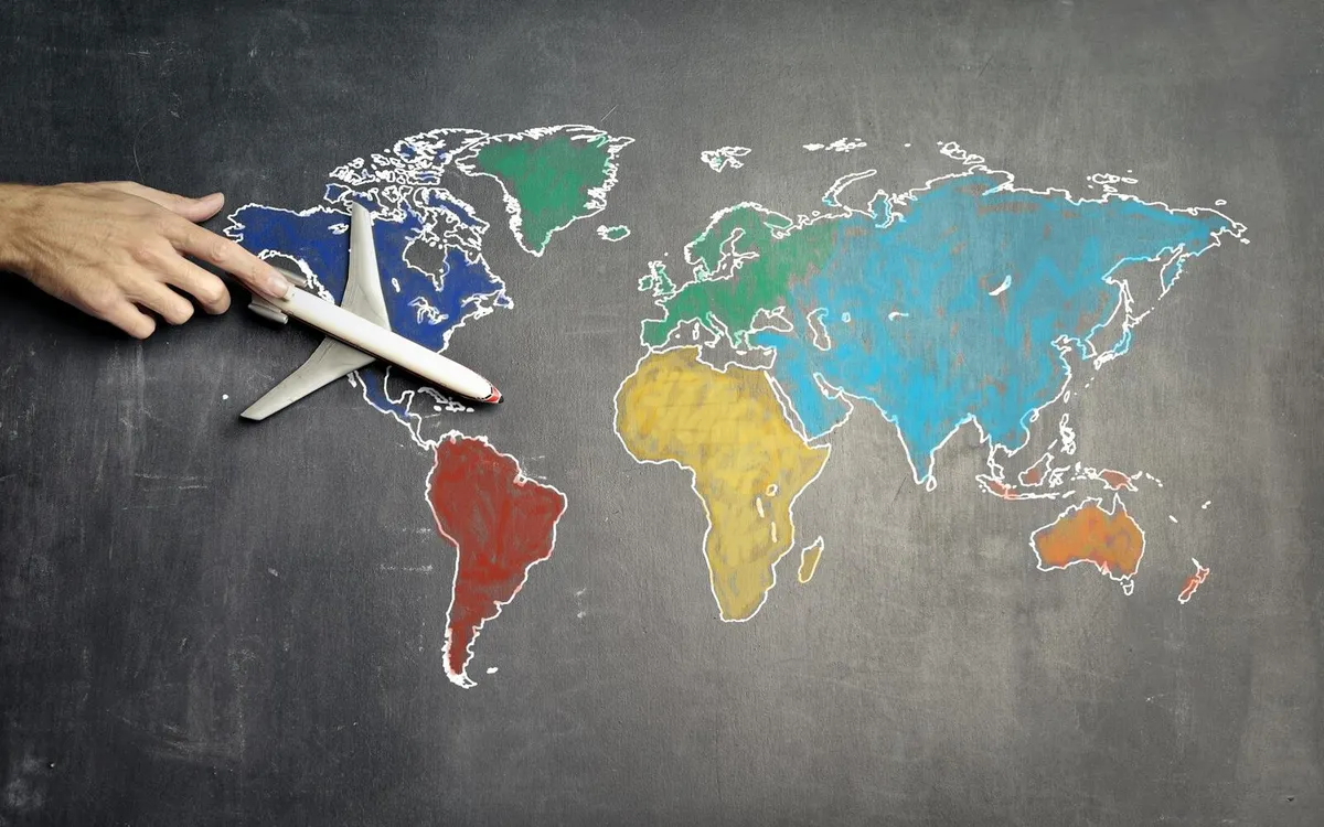 World map and airplane model used for China visa-free transit route planning