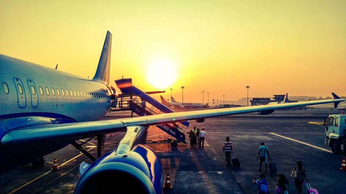 Aircraft at an airport gate representing travel documents and declared baggage before entering China