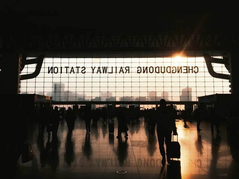 Evening travel scene inside Chengdu Railway Station during a China itinerary