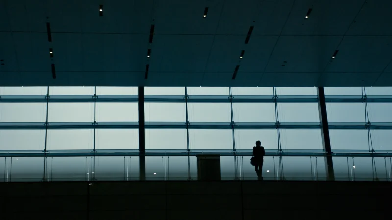 Traveler silhouette inside Shanghai Hongqiao Railway Station