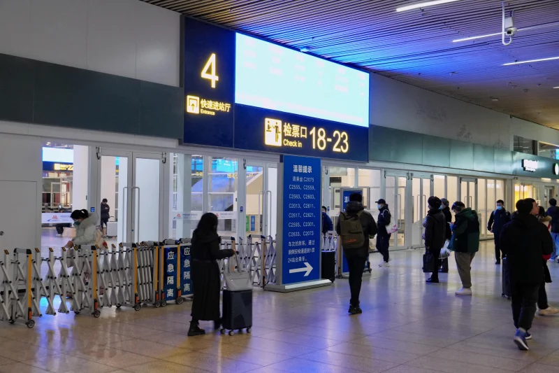 Beijing South Railway Station interior for comparing China rail station access and airport timing