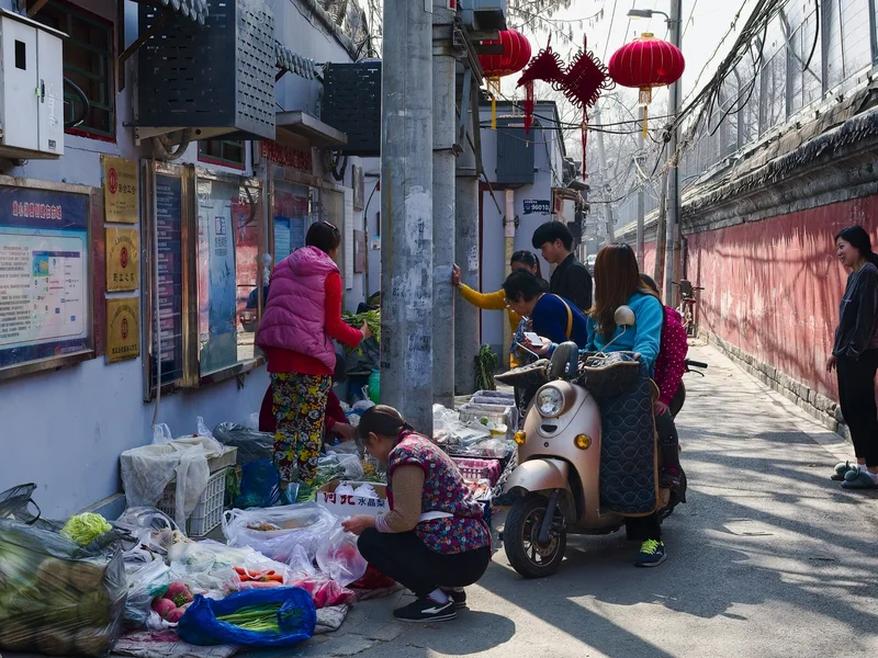 Neighborhood market in Beijing where travelers can think about snacks, water, and meal timing