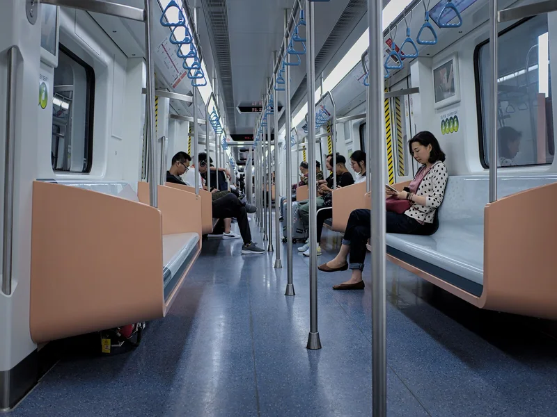 Passengers inside a Shanghai Metro carriage during a regular city trip