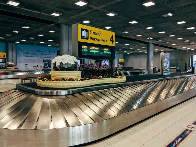 Airport baggage claim area for lost luggage and airline reporting steps